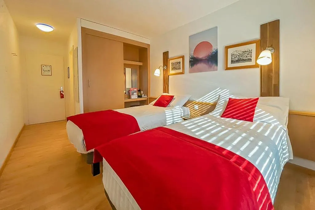 Chambre de l’Hôtel des Alpes à Bulle